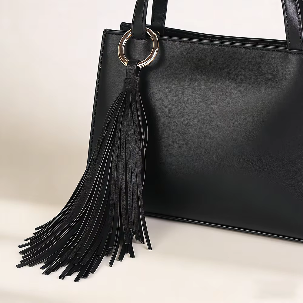 Porte-clés de luxe en cuir souple avec pompon, élégant pendentif de sac, accessoire de clé de voiture, bijou pour femme et fille, cadeau 