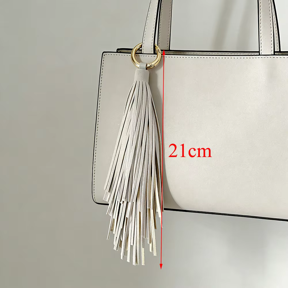 Porte-clés de luxe en cuir souple avec pompon, élégant pendentif de sac, accessoire de clé de voiture, bijou pour femme et fille, cadeau 