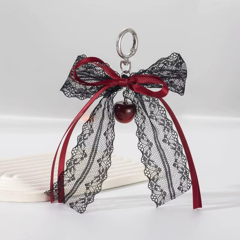 Porte-clés cadeau mignon pour la Saint-Valentin, nœud en dentelle avec chaîne de perles et breloque étoile. Accessoire de sac en ruban de ballet pour femme