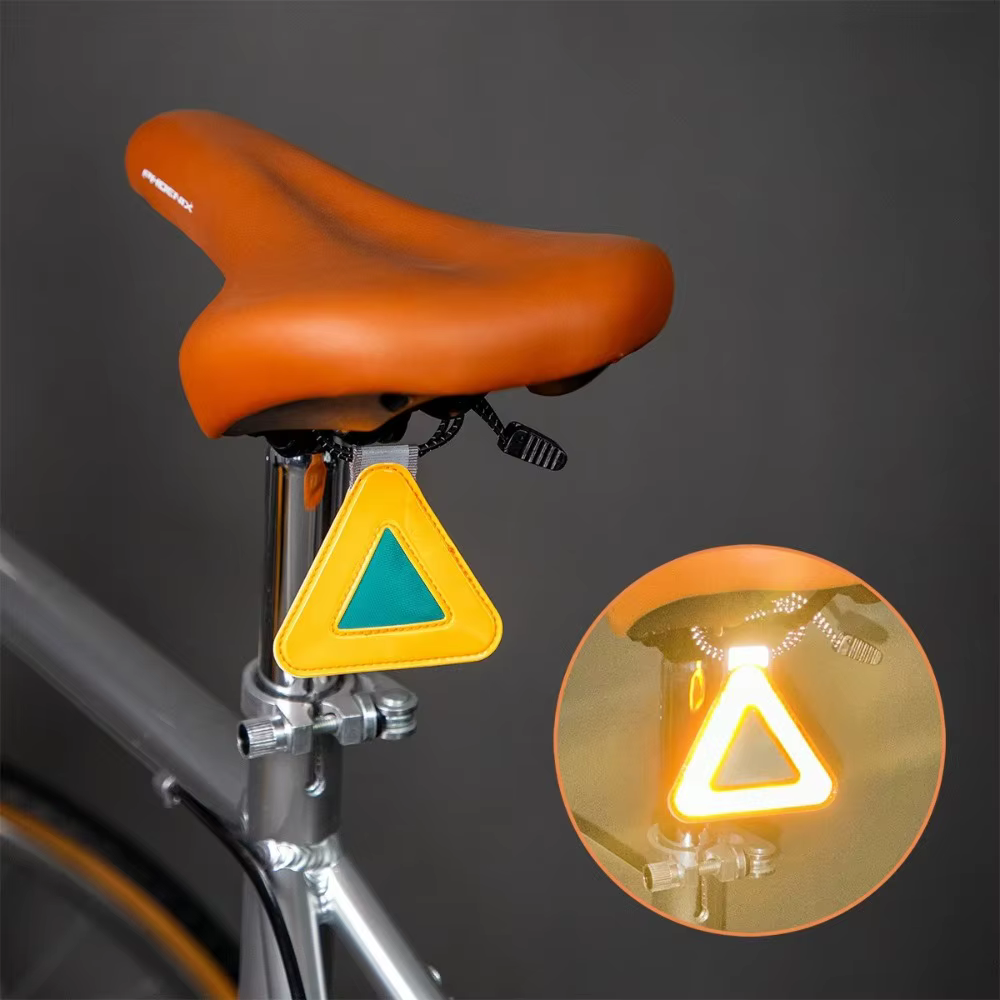 Plaque réfléchissante suspendue pour selle de vélo