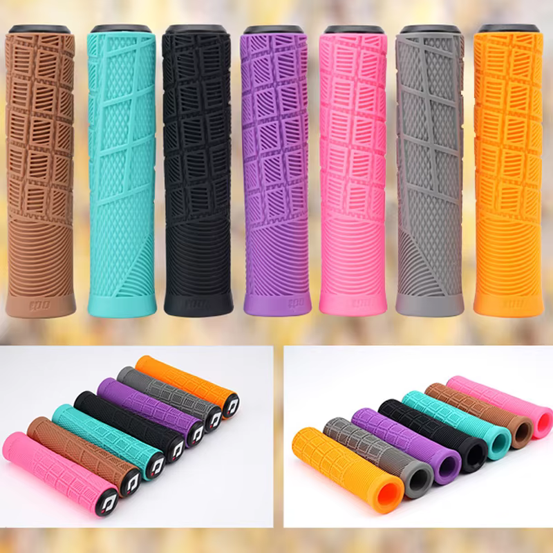 Poignées de vélo en silicone Odi gris orange marron rose violet 22 mm