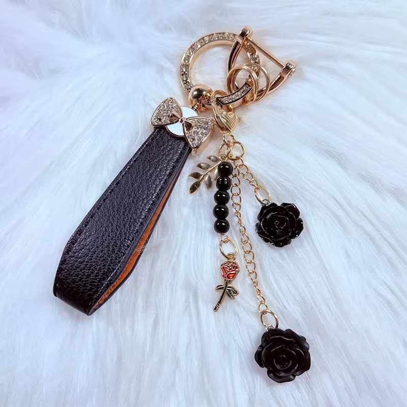 Porte-clés de luxe avec nœud et fleur, accessoire de clé de voiture en cristal élégant, cuir PU Durable, cadeau à la mode pour femmes, apparence exquise