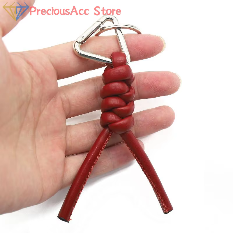 Porte-clés en cuir tissé, outil de Camping en plein air, porte-clés haut de gamme, pendentif de clé Automobile, accessoire de sac suspendu