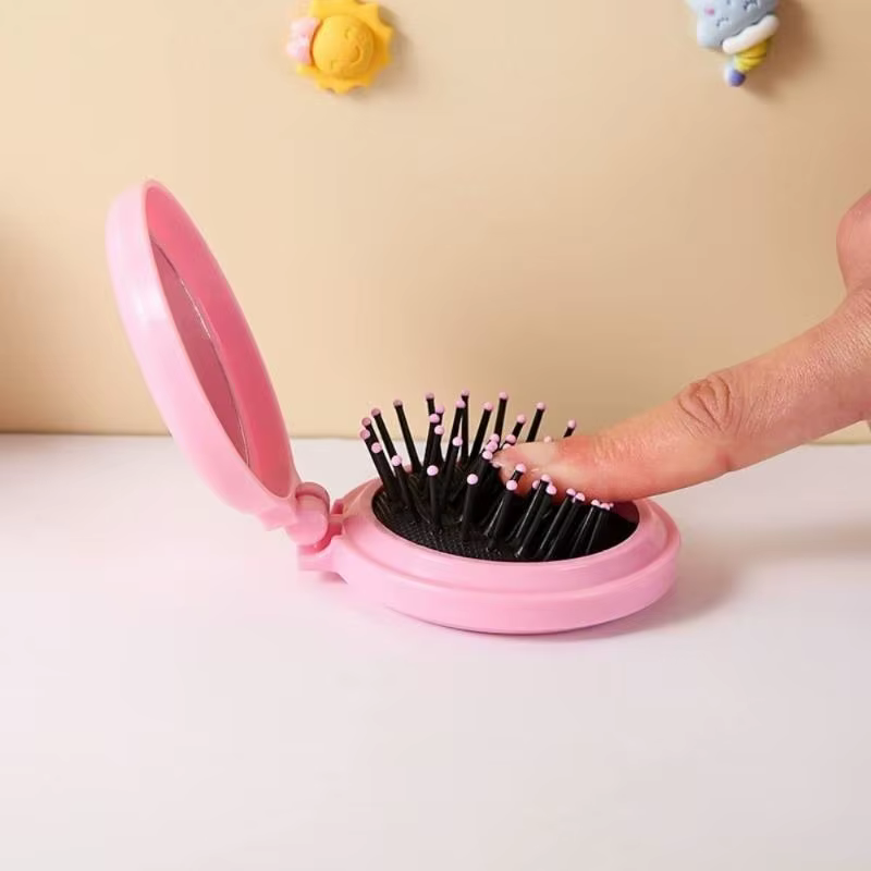 Mini brosse à cheveux ronde pliable pour femmes et filles, brosses de voyage pour cheveux, peigne de poche, brosse à cheveux avec miroir.